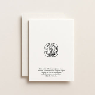 White card with black text and logo on a beige background