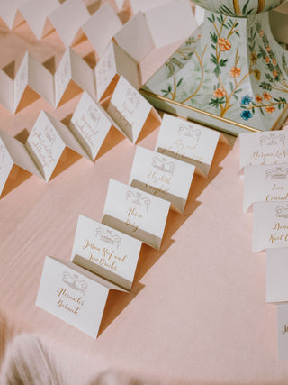 gold-foil-bow-calligraphy-table-cards