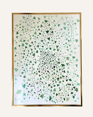 Framed artwork with a green and white pattern on a white background