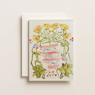Greeting card with floral design and 'Sending love your way' text on a light background