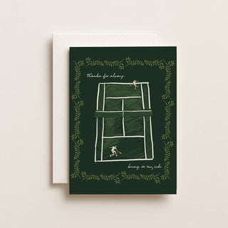 Greeting card with tennis court design and text on a green background